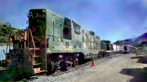 Budget-priority render at 18.71 dB: strongest structure yet on the locomotive